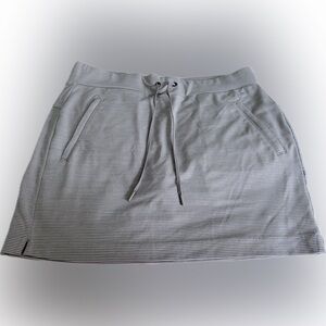 Athletea size small skort gray striped Glif athletic 2 front  pockets 1 back
